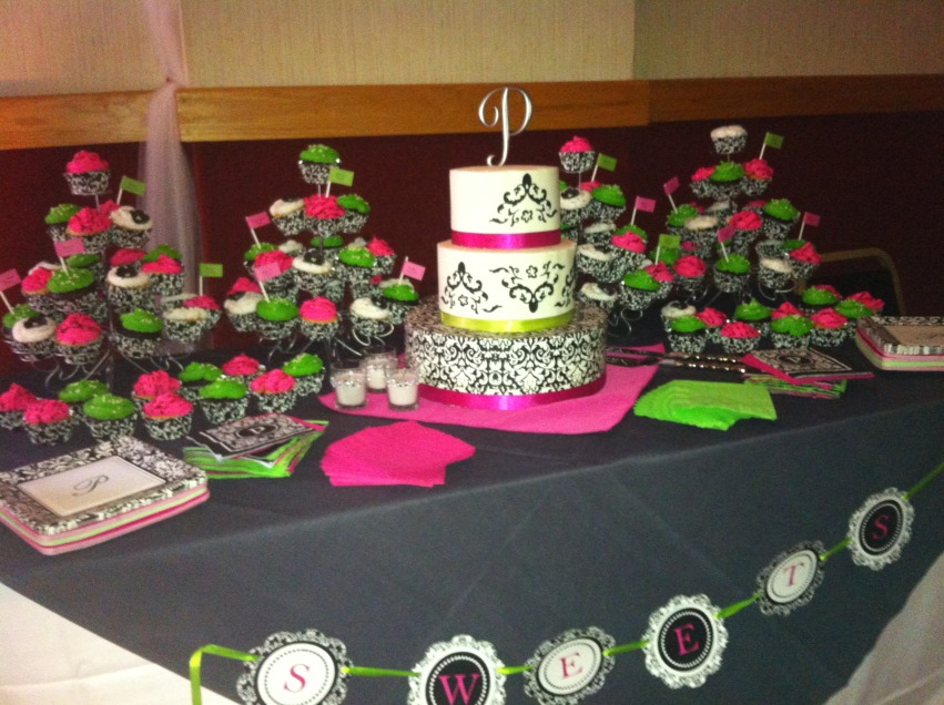 Demask black and white wedding cake with pink and green accents